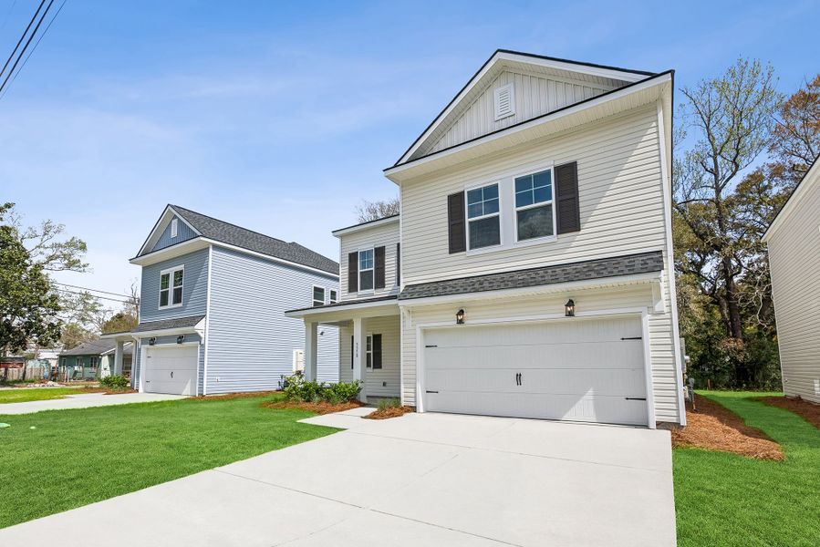 Front exterior of a new home in Discover - Select, Charleston, SC, highlighting curb appeal (Image 20).