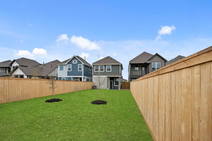 Exterior details and patio area of a home in Bridgeland, Cypress (Image 4). Exterior details and patio area of a home in Bridgeland, Cypress (Image 4).