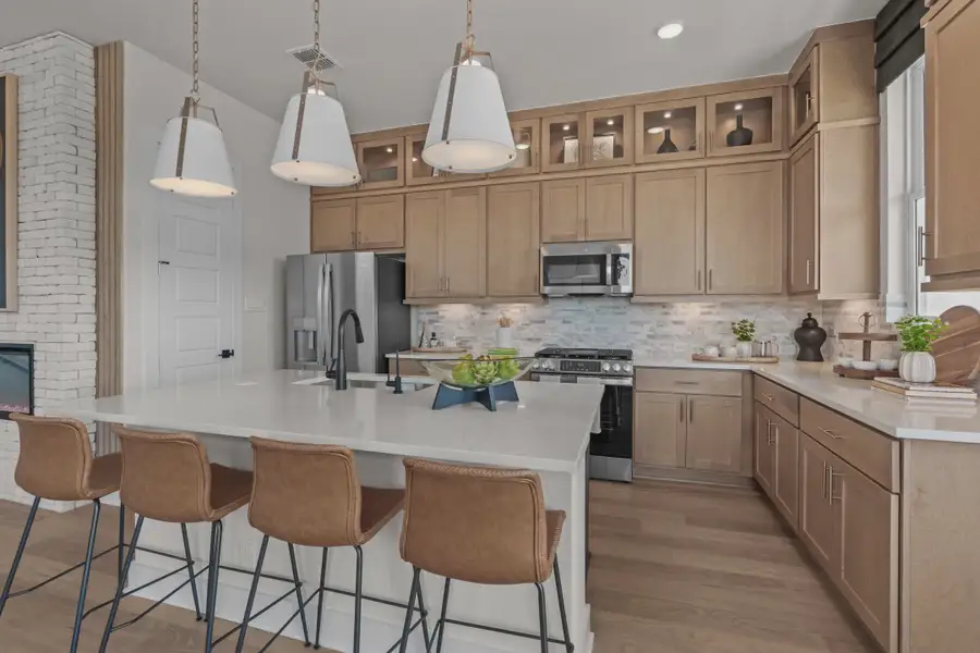Representative furnished interior of a home built from the Apollo by Chesmar Homes in Prominence Urban, San Antonio (Image 4).