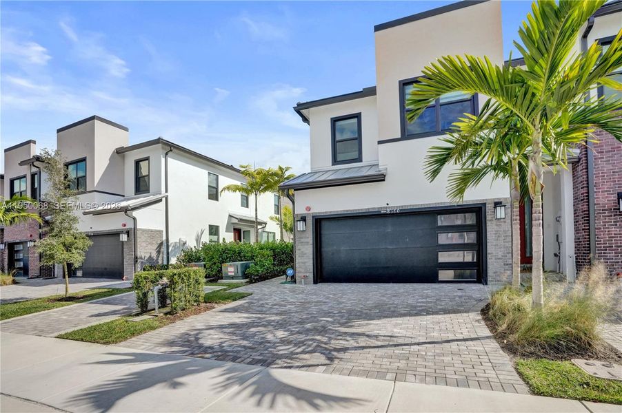 Front exterior of a new home in , Plantation, FL, highlighting curb appeal (Image 28).