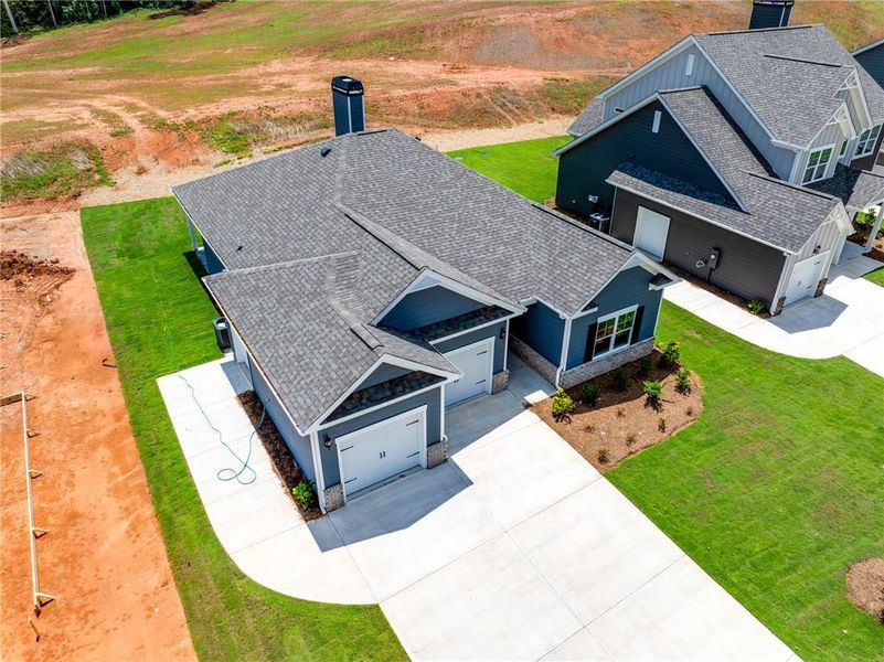 Front exterior of a new home in , Homer, GA, highlighting curb appeal (Image 2).