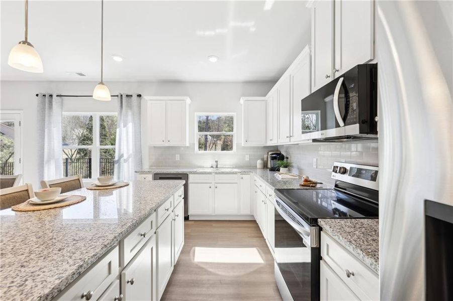 Furnished interior view inside a new home in The Hills at Cedar Creek, Winder (Image 22).