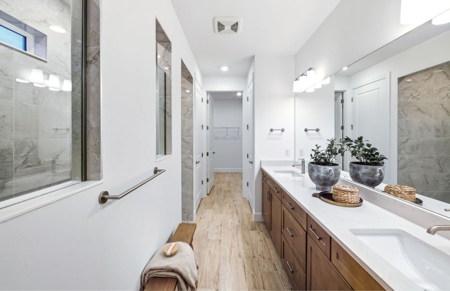 Representative furnished interior of a home built from the Palmary by DiVosta in BeachWalk by Manasota Key, Englewood (Image 14).