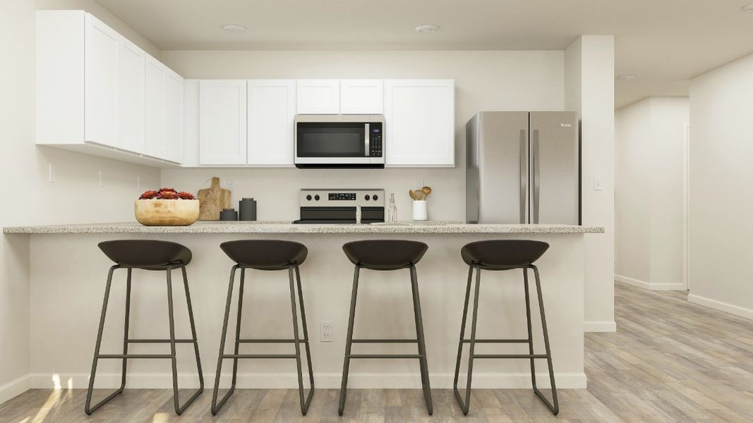A kitchen with stools and a table. A kitchen with stools and a table.