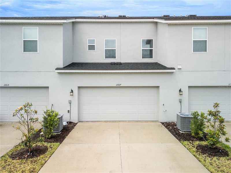 Front exterior of a new home in , Orlando, FL, highlighting curb appeal (Image 16). Front exterior of a new home in , Orlando, FL, highlighting curb appeal (Image 16).