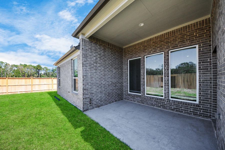 Experience outdoor living at its finest on this expansive covered patio, thoughtfully designed for BBQs and delightful outdoor dining. Experience outdoor living at its finest on this expansive covered patio, thoughtfully designed for BBQs and delightful outdoor dining.