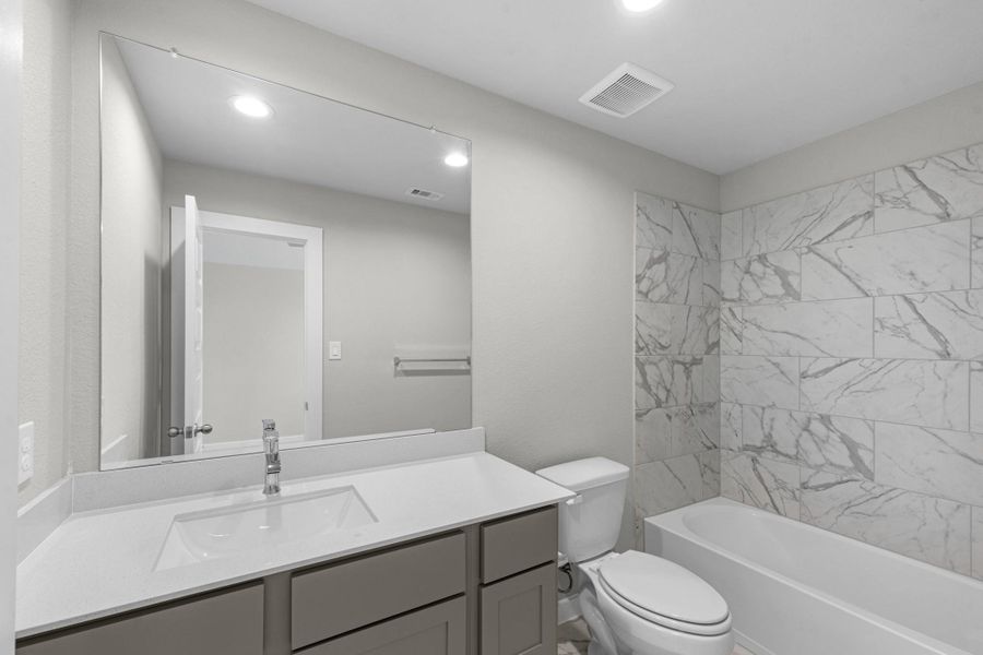 Furnished interior view inside a new home in Briarwood Crossing, Rosenberg (Image 15).