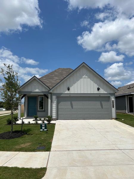 Front exterior of a new home in Cornerstone, Rockdale, TX, highlighting curb appeal (Image 1). Front exterior of a new home in Cornerstone, Rockdale, TX, highlighting curb appeal (Image 1).