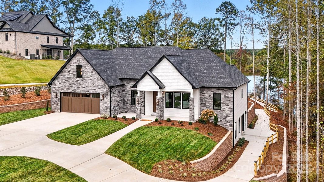 Front exterior of a new home in , Granite Falls, NC, highlighting curb appeal (Image 2). Front exterior of a new home in , Granite Falls, NC, highlighting curb appeal (Image 2).