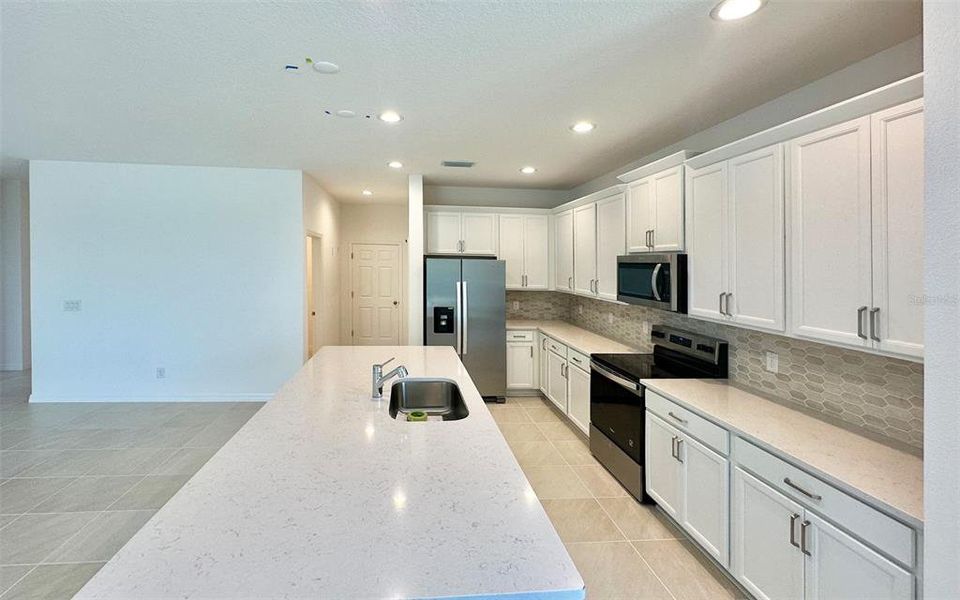 Furnished interior view inside a new home in Trinity Place, St. Cloud (Image 8).