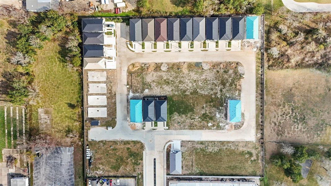 An aerial top-down view shows the property's position within the planned community and its proximity to the central green space.
