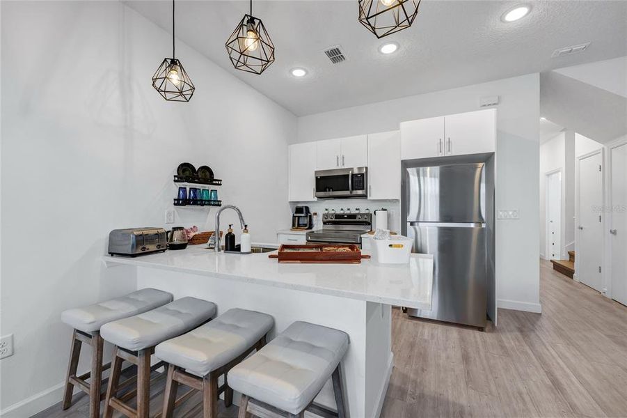 Furnished interior view inside a new home in , Davenport (Image 9).