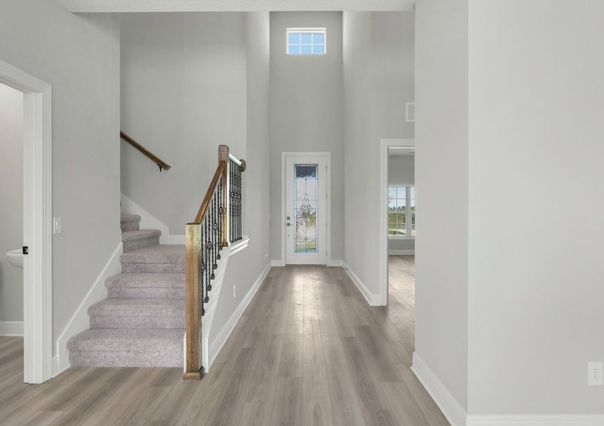 The entryway is highlighted by gorgeous high ceilings. The entryway is highlighted by gorgeous high ceilings.