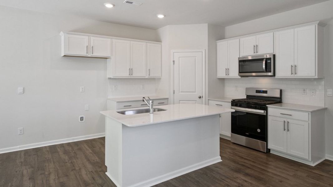 Representative furnished interior of a home built from the CARSON by D.R. Horton in Copper Run South, Durham (Image 5).