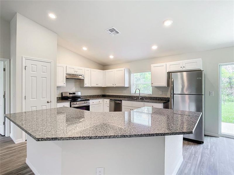Furnished interior view inside a new home in , Port Charlotte (Image 4).