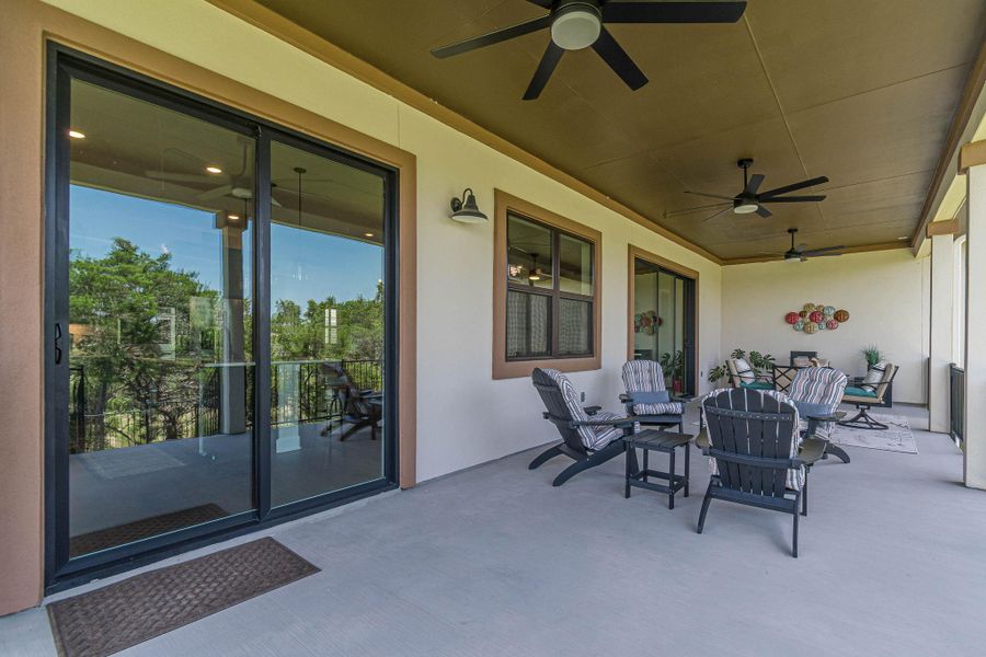 View of patio / terrace with a ceiling fan and outdoor lounge area