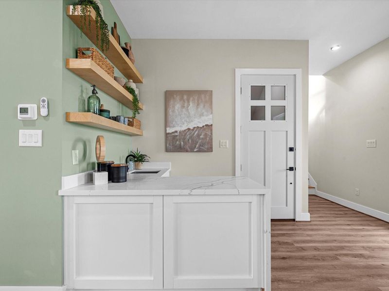 The wet bar is a perfect area to prepare some cocktails and entertain with friends! The wet bar is a perfect area to prepare some cocktails and entertain with friends!