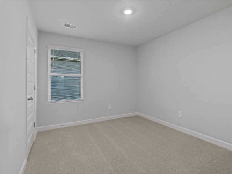 Spacious, unfurnished interior of a new home in Brayfield Manor - Heritage Collection, Wellford (Image 15).