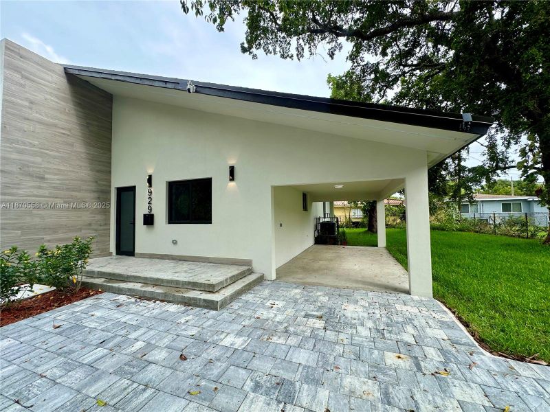 Front exterior of a new home in , Miami, FL, highlighting curb appeal (Image 29).