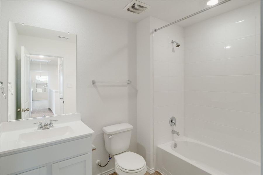 Furnished interior view inside a new home in Prairie Lakes, Buda (Image 6). Furnished interior view inside a new home in Prairie Lakes, Buda (Image 6).