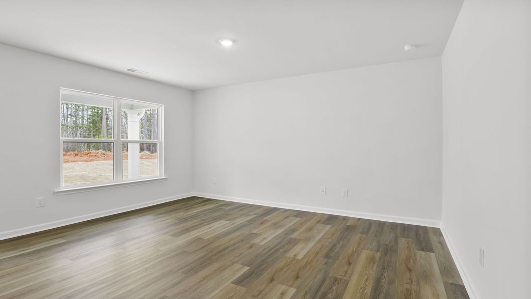 Spacious, unfurnished interior of a new home in Bentley Park, Greenwood (Image 21).