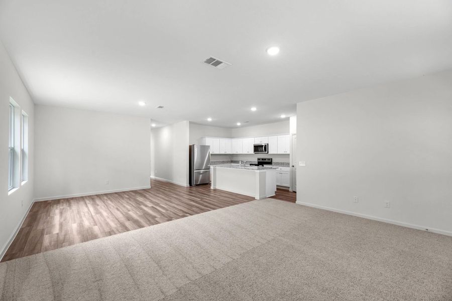 Representative unfurnished interior of a home built from the Prism by Starlight Homes in Eagles Landing, Elgin (Image 11).