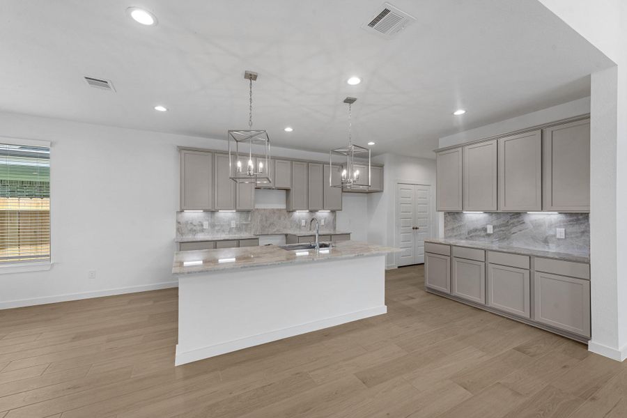 Furnished interior view inside a new home in Grand Mason Crossing, Katy (Image 9).