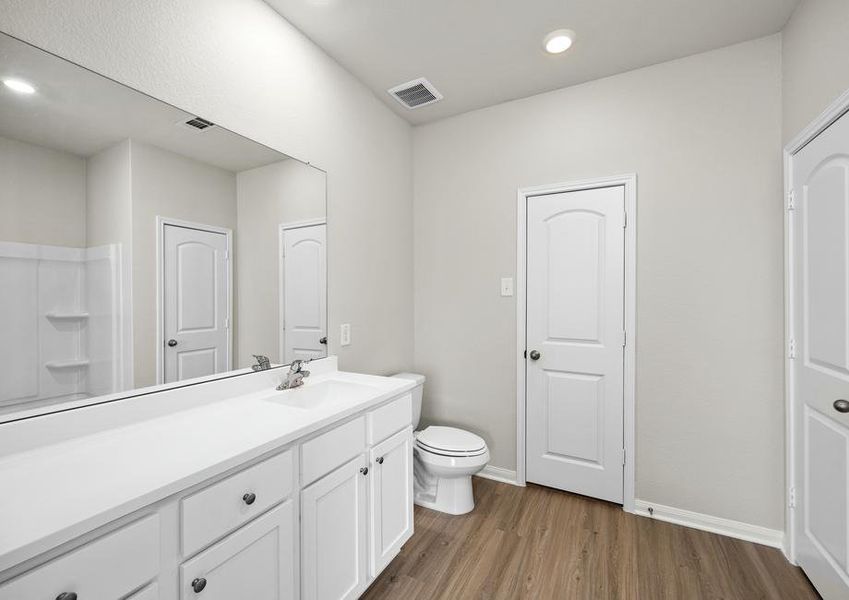 The master bath has a stunning vanity!