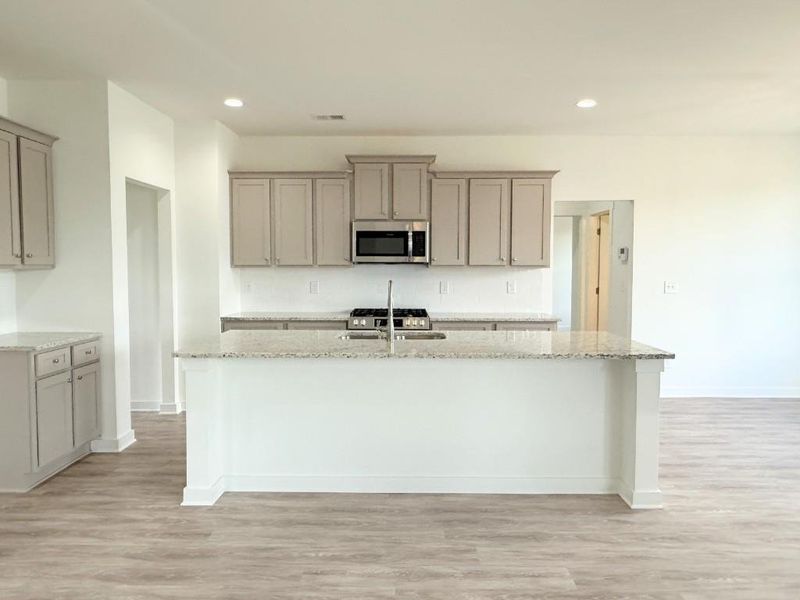 Furnished interior view inside a new home in Sutton's Landing, Statham (Image 9).