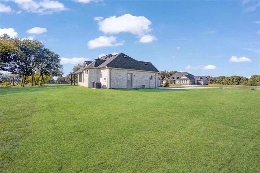 5 inch plank true lightly scraped hard wood flooring throughout all of the living, dining and Primary Bedroom. 5 inch plank true lightly scraped hard wood flooring throughout all of the living, dining and Primary Bedroom.
