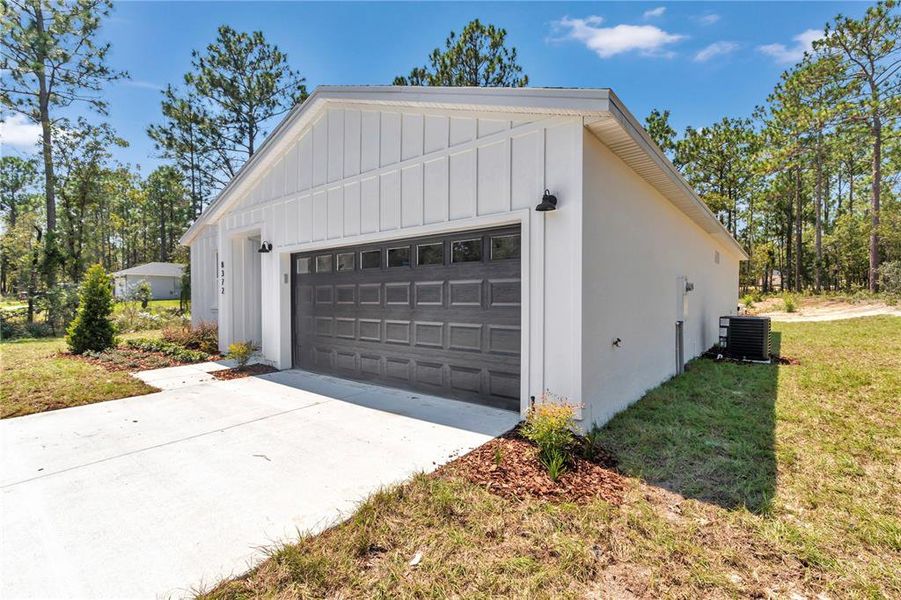 Front exterior of a new home in , Dunnellon, FL, highlighting curb appeal (Image 24).