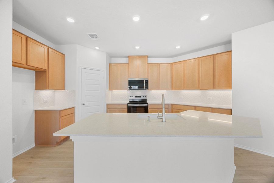 Furnished interior view inside a new home in Retreat at San Gabriel, Georgetown (Image 5). Furnished interior view inside a new home in Retreat at San Gabriel, Georgetown (Image 5).