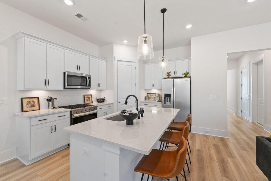 Furnished interior view inside a new home in Summerwind Crossing at Lakes of Cane Bay, Summerville (Image 18).