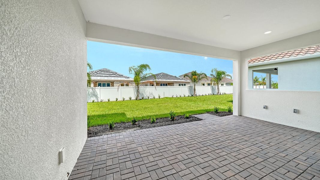 Exterior details and patio area of a home in Windward Real Estate and Homes for Sale in Sarasota, FL - Neal Communities, Lakewood Ranch (Image 29).
