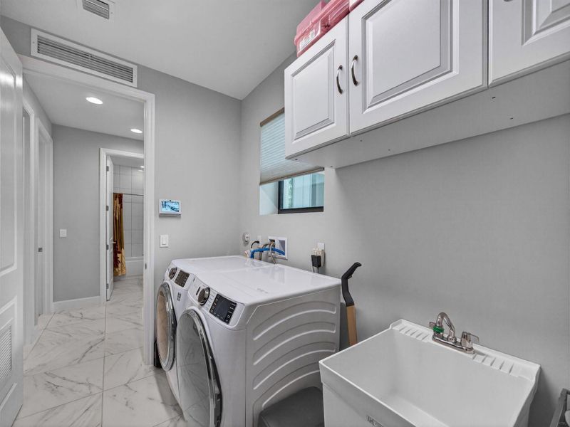 Furnished interior view inside a new home in , Port St. Lucie (Image 9).