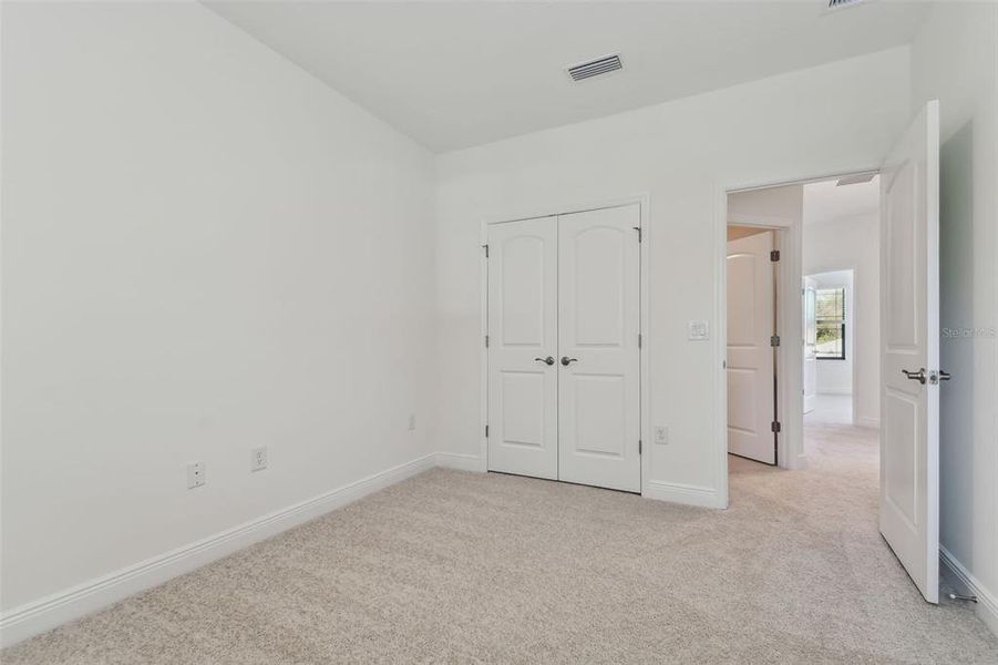 Photos are not the home listed, but same floor plan.