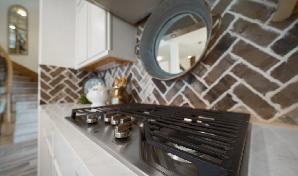 Kitchen with decorative backsplash