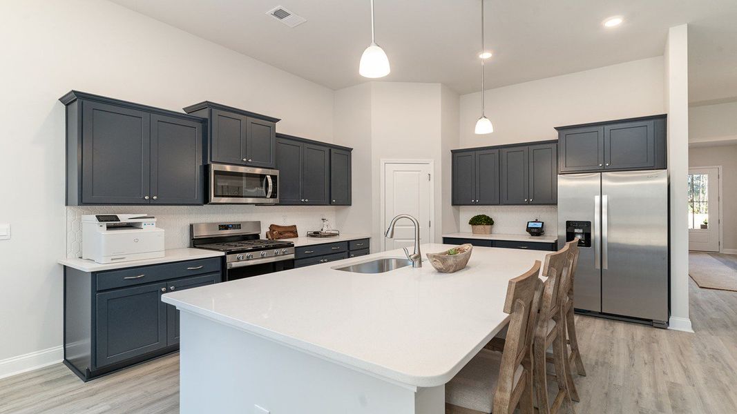 Furnished interior view inside a new home in The Bluffs at Mill Creek, Florence (Image 4).