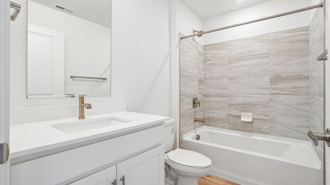 Furnished interior view inside a new home in Trails at Crowfoot, Parker (Image 9).