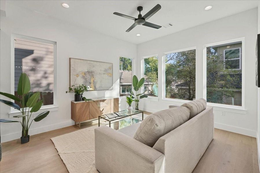 This serene living space awaits, with abundant windows providing plenty of natural light