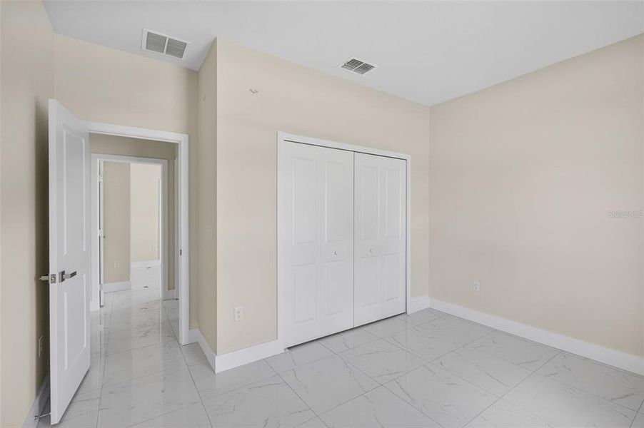 Spacious, unfurnished interior of a new home in , Port Charlotte (Image 31).