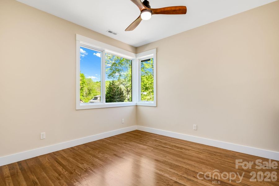 Spacious, unfurnished interior of a new home in , Black Mountain (Image 26).