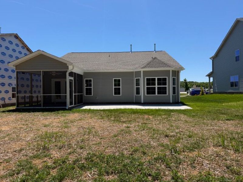 Exterior details and patio area of a home in Royal Pines, Trinity (Image 4).