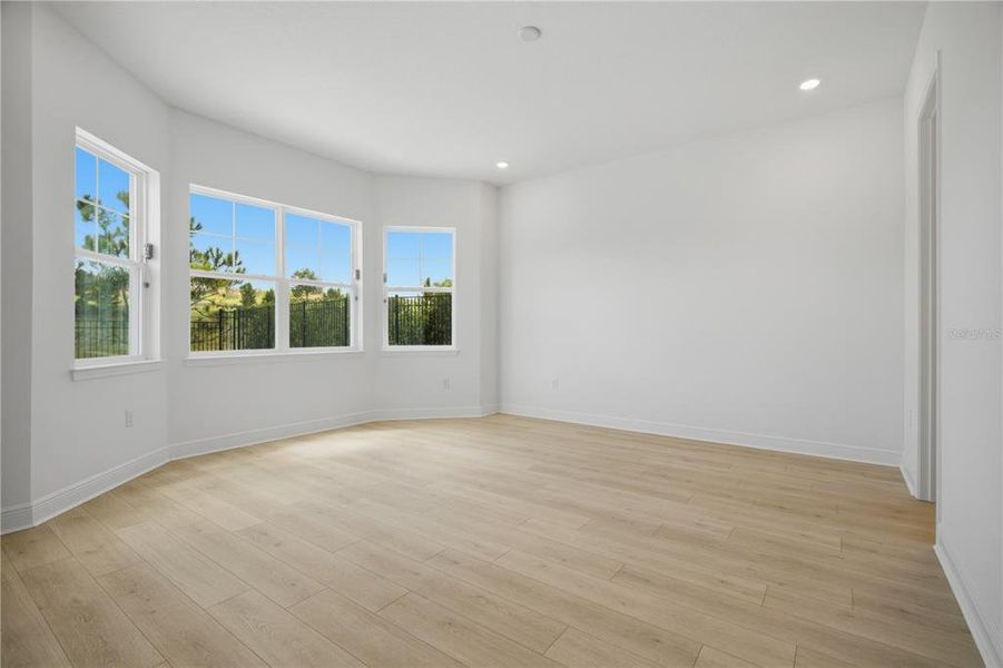Spacious, unfurnished interior of a new home in Bella Collina, Montverde (Image 25).