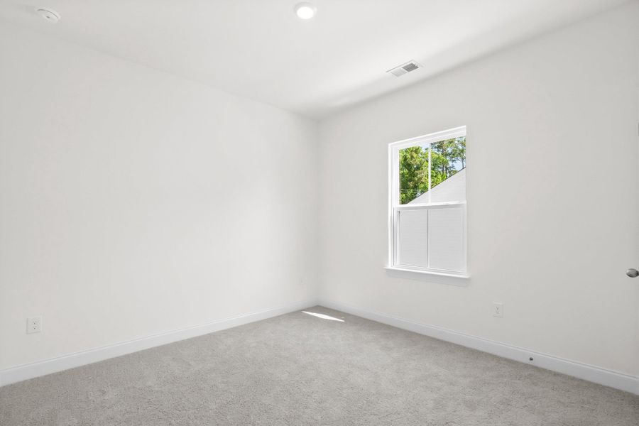 Spacious, unfurnished interior of a new home in Downtown Loris Homes, Loris (Image 22).