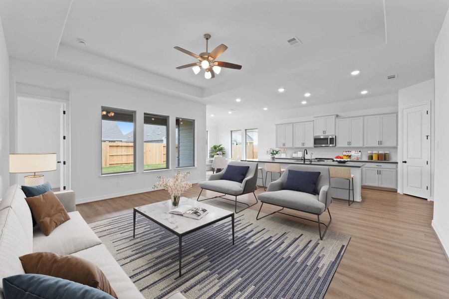 Open concept living space. Note: Sample product photo. Actual exterior and interior selections may vary by homesite. Photo may be virtually staged