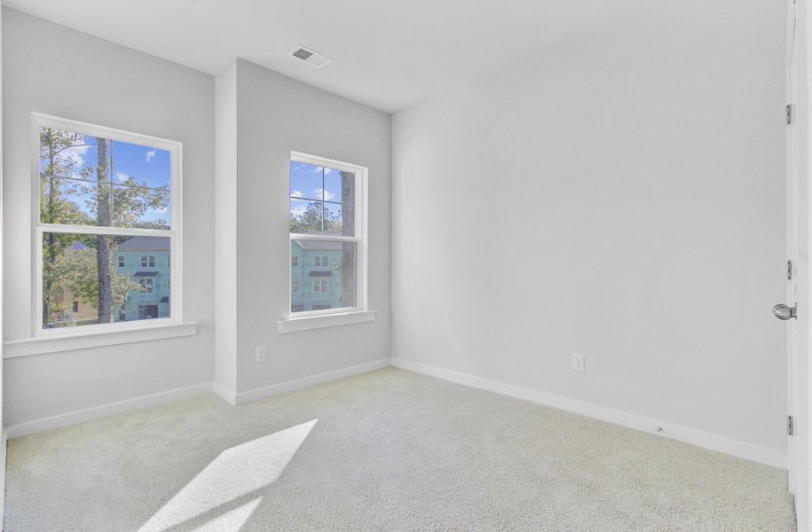 Spacious, unfurnished interior of a new home in Indigo Grove Townhomes, Johns Island (Image 46).
