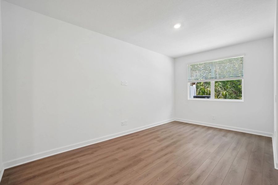Spacious family room with a double window for extra natural light