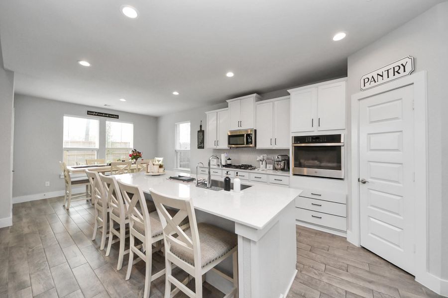 Furnished interior view inside a new home in , Conroe (Image 7).