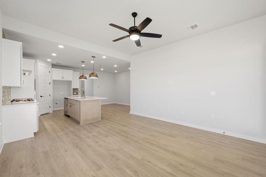Spacious, unfurnished interior of a new home in Terrace Collection At Turner's Crossing, Buda (Image 22).